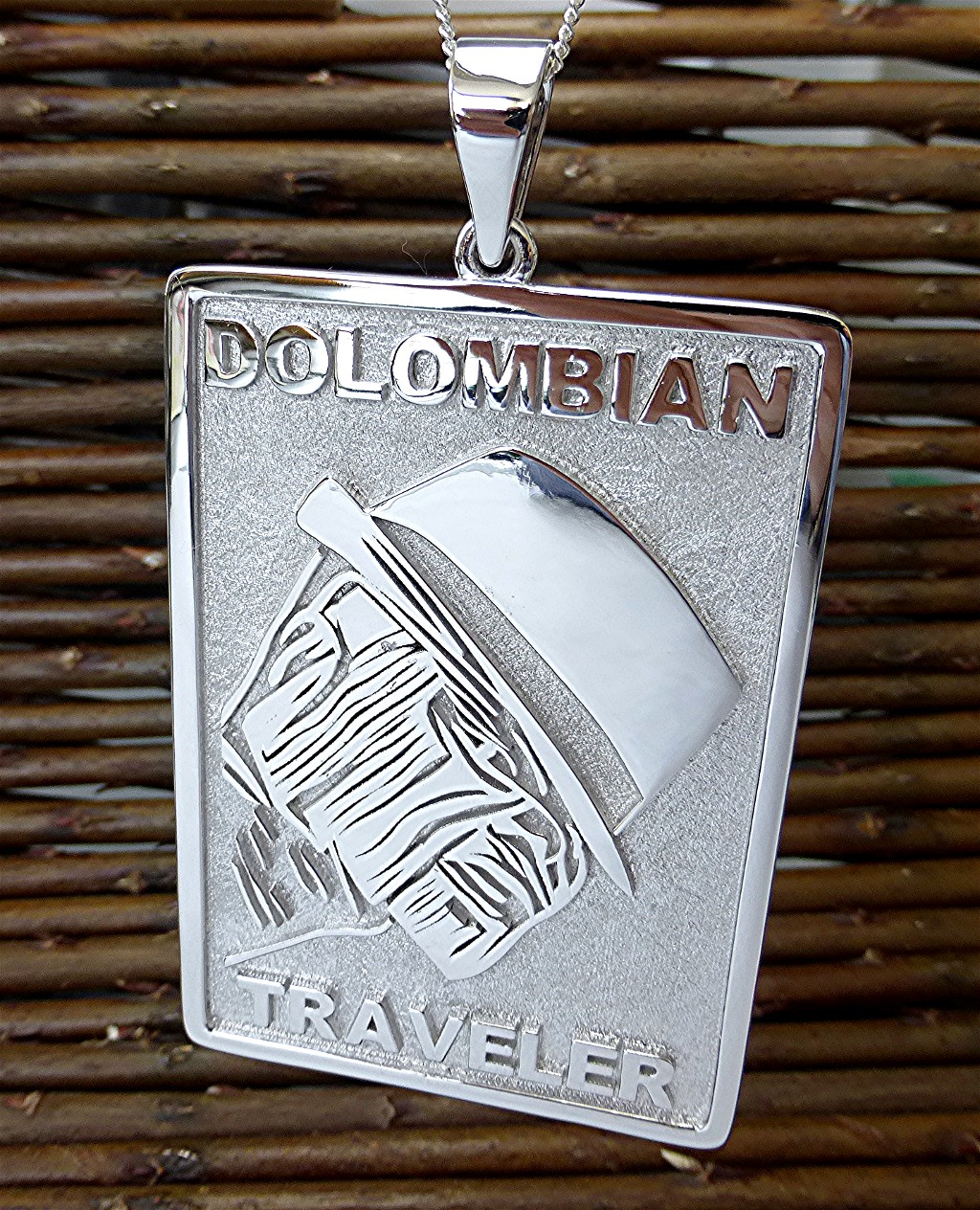 Traveler logo pendant