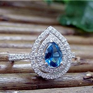 Diamond pear shape double halo ring