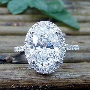 Four carat oval diamond engagement ring