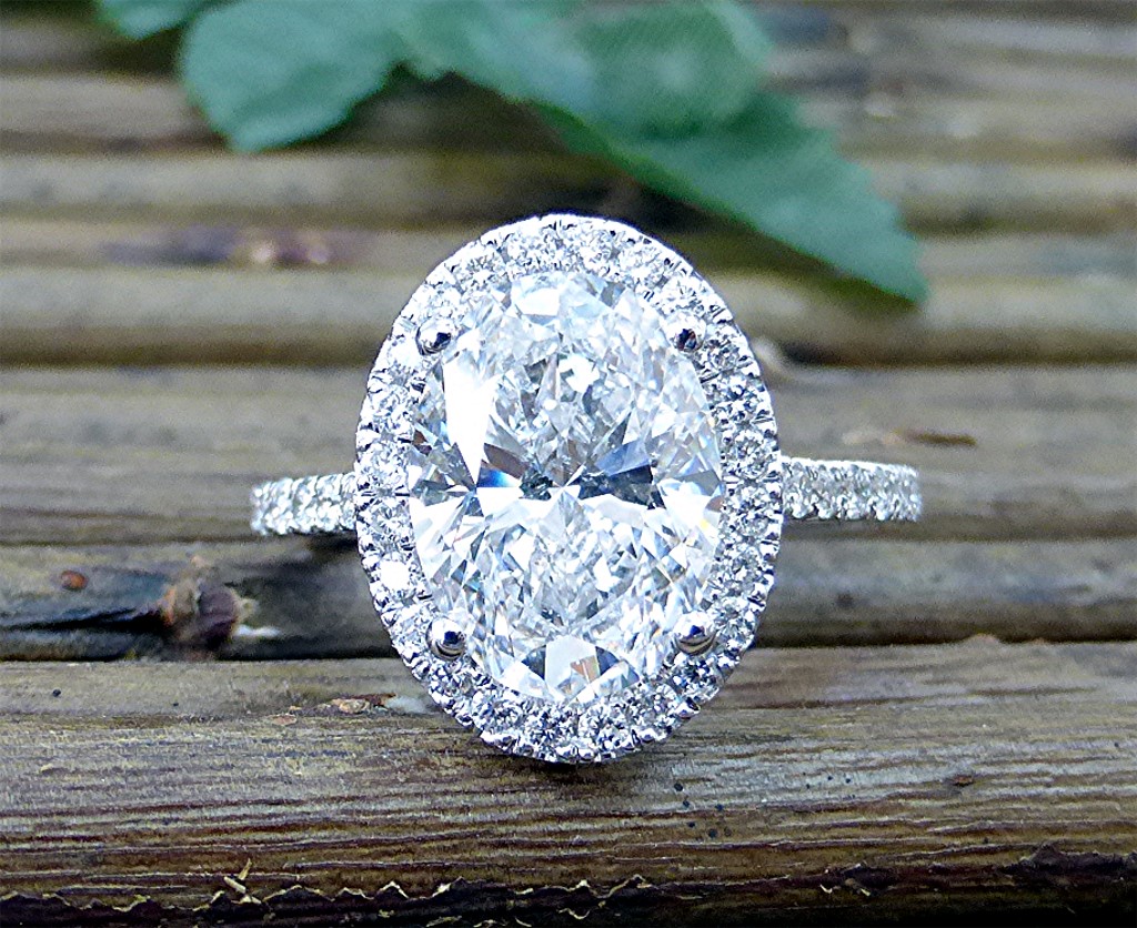 Four carat oval diamond engagement ring