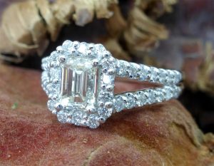 Emerald cut halo engagement ring