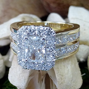 Emerald cut halo engagement ring