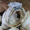 Emerald cut halo engagement ring