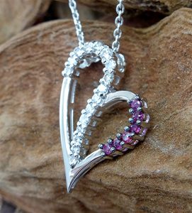14k white diamond and ruby heart pendant