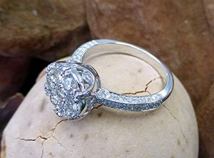 Cluster top engagement ring