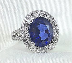 Double halo diamond and sapphire ring