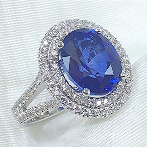Double halo diamond and sapphire ring