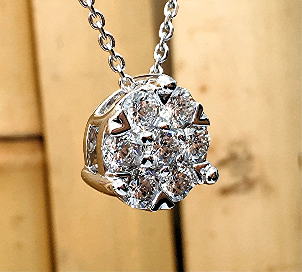Seven diamond round cluster pendant