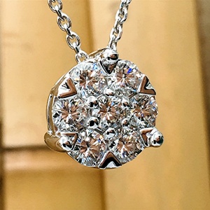 Seven diamond round cluster pendant