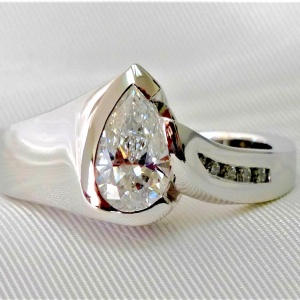 Pear shaped diamond engagement ring