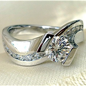 Tension set twisted engagement ring