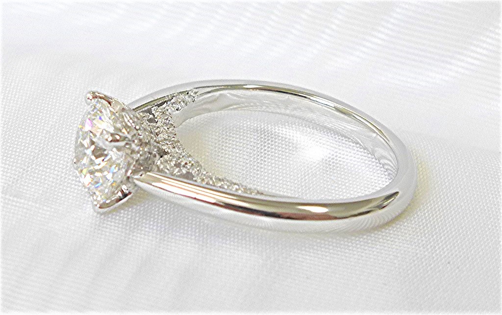 Diamond Engagement ring scroll work head and profile