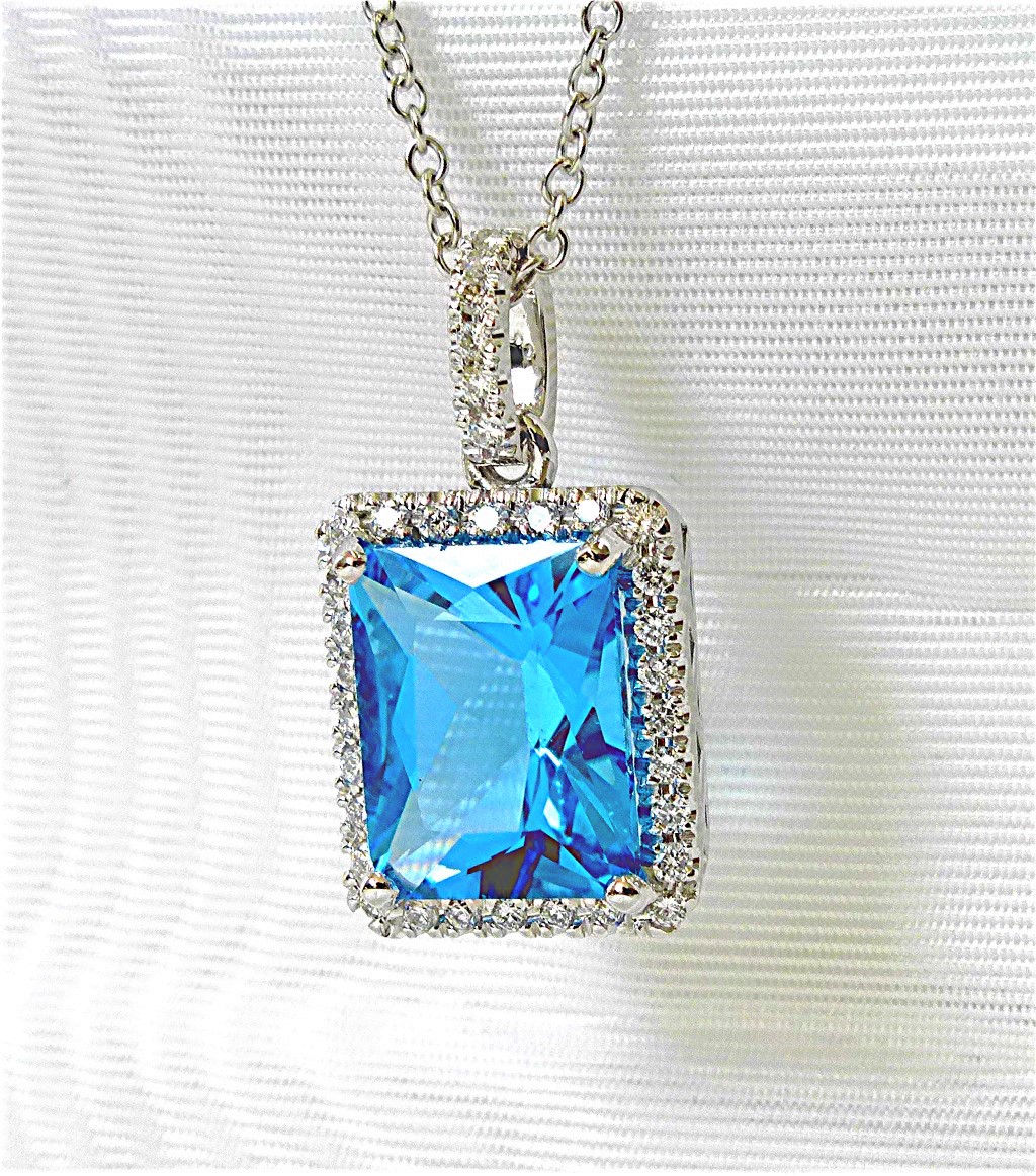 Matching Diamond and blue topaz pendant