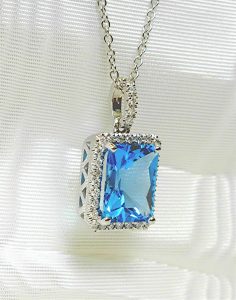 Matching Diamond and blue topaz pendant