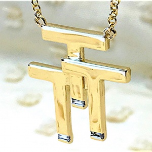 Triple “T” Necklace