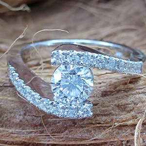 Bypass diamond engagement ring