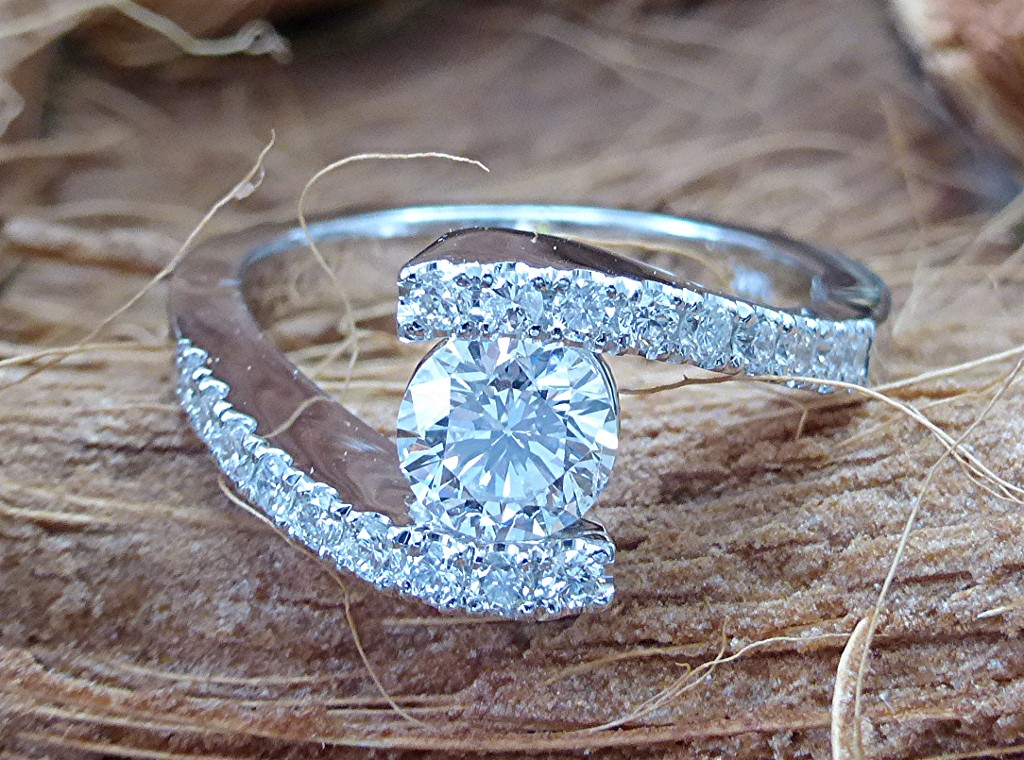 Bypass diamond engagement ring