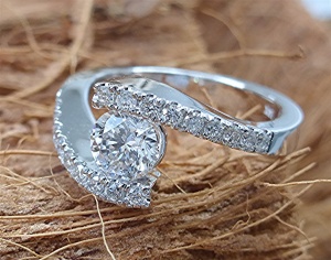 Bypass diamond engagement ring