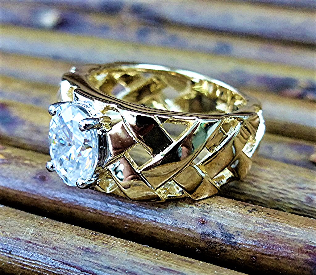 Woven Gold and moissanite ring