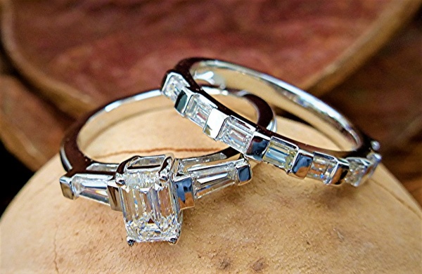 Three stone engagement ring and band set