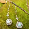 Dangling halo diamond and opal earring